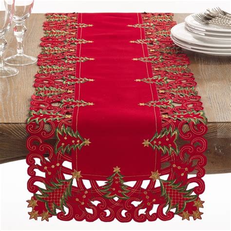 A Red Table Runner On Top Of A Wooden Table