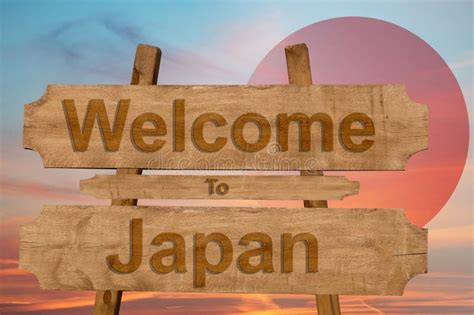 Welcome To Japan Sign On Wood Background With Blending National Flag