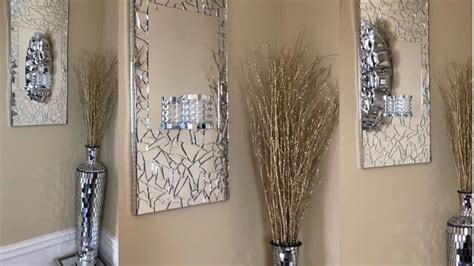 You only need to buy a mirror, some paint and hot glue sticks to finish such project. Dollar Tree DIY || Mirrored Wall Sconce || Glam Edition- YouTube | Mirrored wall sconce, Diy ...