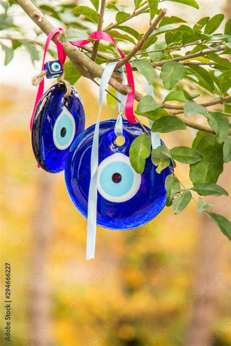 The Branches Of The Old Tree Decorated With The Eye Shaped Amulets