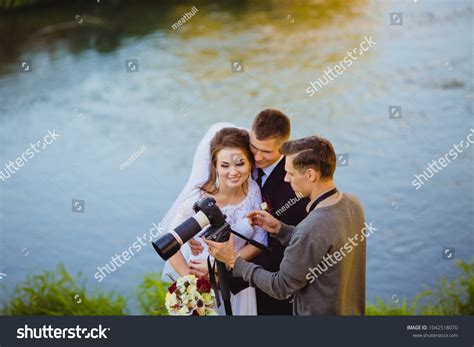 Photographer Showing Bride Groom Had Just Stock Photo