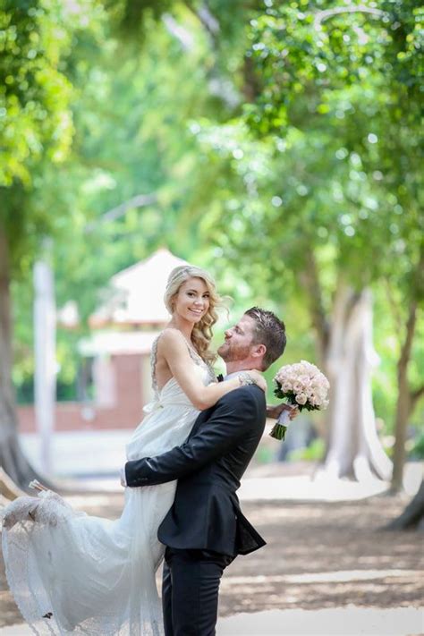 Bride And Groom Pose For Wedding Images In Brisbanes Botanical Garden