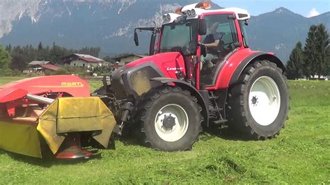 Lindner (agricultural machinery manufacturer), an austrian family company. Lindner Geotrac 124 beim Mähen - YouTube