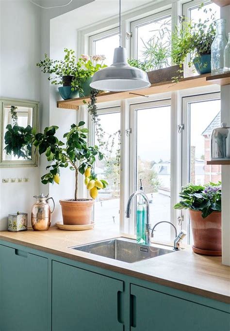 I hope this helps you decide how to decorate the top of your kitchen cabinets. 10 Genius Ways to Use That Awkward Space Above Your ...