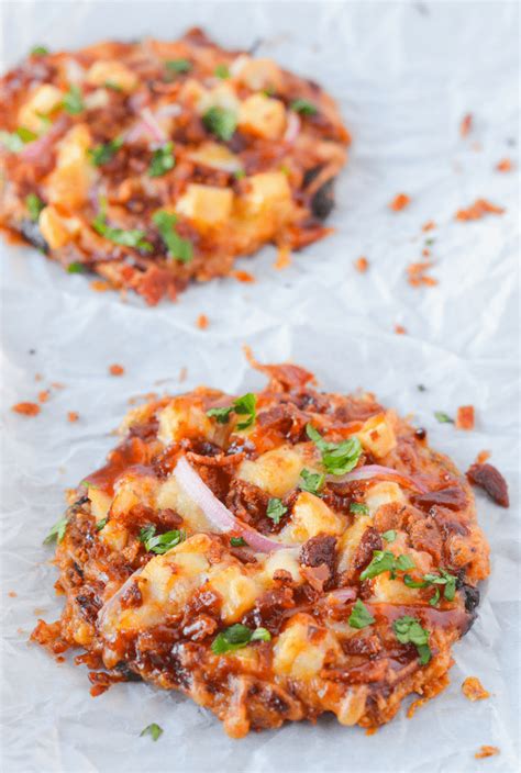Cover the crust in pizza sauce (1/2 cup), mozzarella cheese (2 cups) then desired toppings. best-low-carb-pizza-crust-1 - Hey Keto Mama