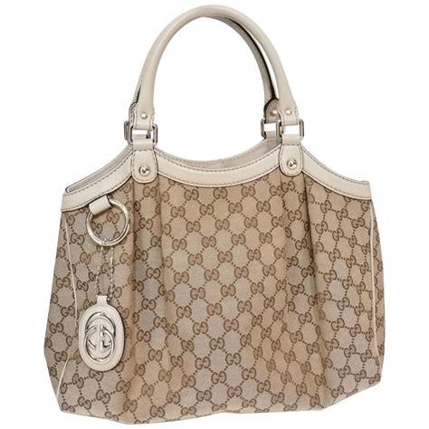 Gucci Monogram Bag With Chainsaw