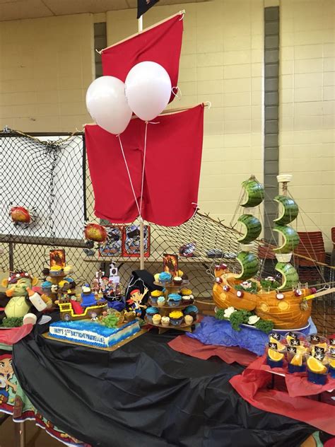 Dress guests in eye patches, pirate hooks and more accessories! Jake and the Neverland pirate dessert table | Diy party, Elegant decor, Pirate party