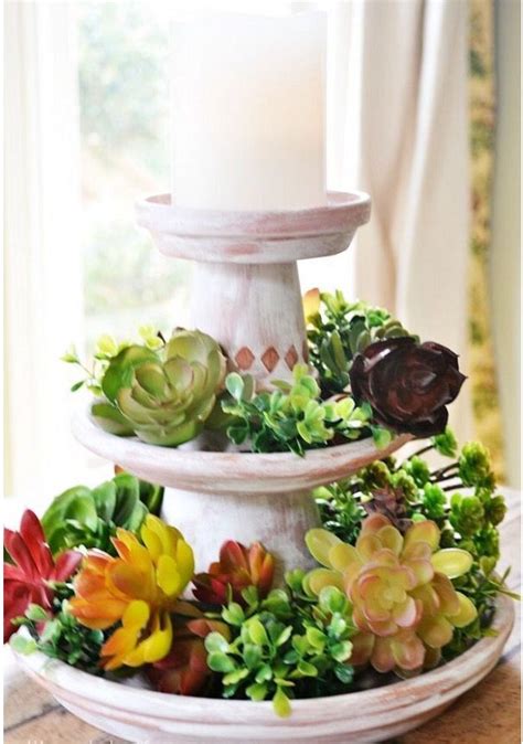Clay Pots And Saucers Make A Beautiful Centerpiece Clay Pot Projects