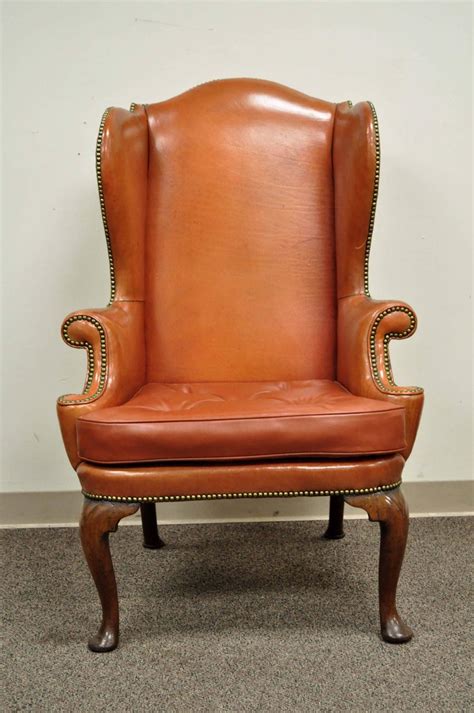 Sink into a timelessly luxe leather armchair. Antique 19th Century Burnt Orange Distressed Leather ...