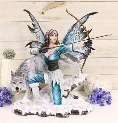 Ebros T Large Snowcap Winter Huntress Fairy With Bow And Arrow By A