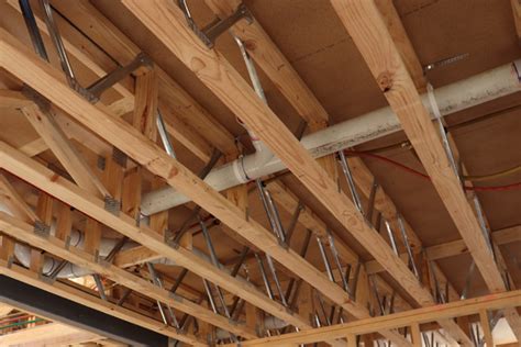 If we go any larger, it will require more webbing inside the truss, which will directly affect the cost of this truss has a 30' span, which is only 4' more than 26' but look how much more webbing there is. Pryda Floor Trusses and Cassettes - Flooring Systems