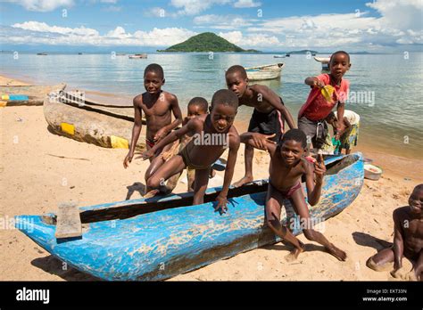 Traditional Dug Out Canoes On A Beach At Cape Maclear On The Shores Of