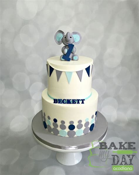 Browse through some unique and personalized 1st birthday invitations and get ready to enjoy the festivites! Boys first birthday cake. Iced in buttercream with a navy, light blue, grey gray and white color ...