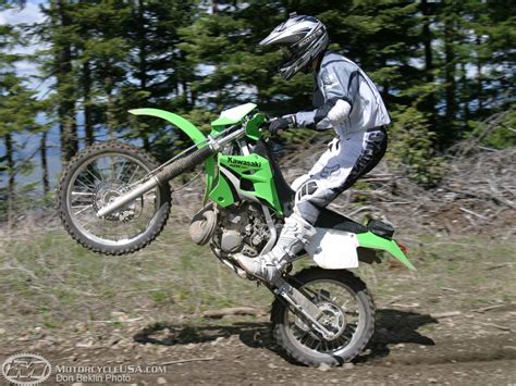 Available as green, or blue frame with white plastic. Kawasaki KDX220SR