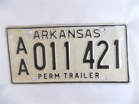 Incredible Arkansas antique car license plate with Original Part