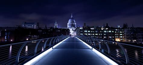 Millennium Bridge And St Pauls At Night By Simonbradfield