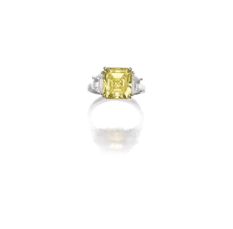 433 Fancy Intense Yellow Diamond And Diamond Ring