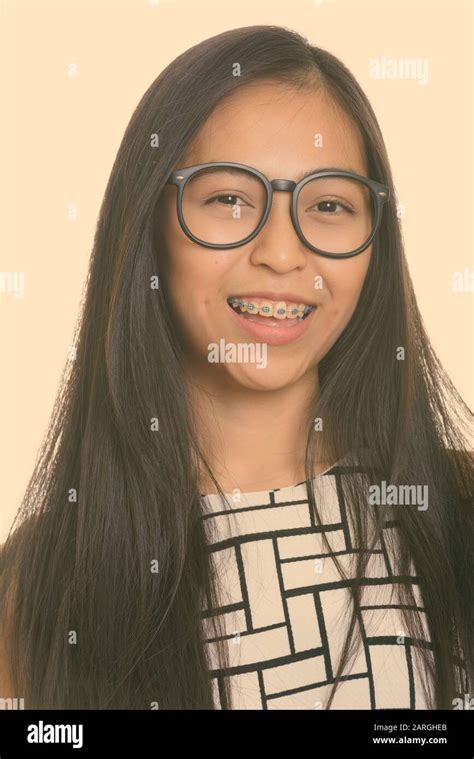 Face Of Young Happy Asian Teenage Nerd Girl Smiling Stock Photo Alamy