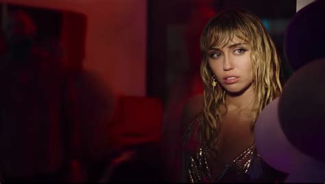 Watch Miley Cyrus Unveils Stunning Music Video For Sliding Away