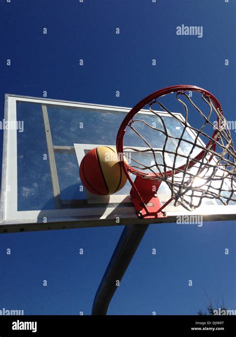 Basketball Stuck On Hoop Stock Photo Alamy