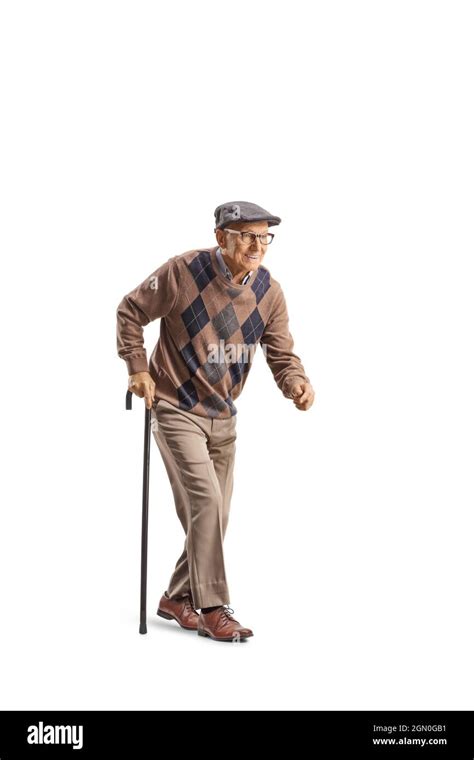 Senior Man With A Walking Cane Walking Slowly Isolated On White