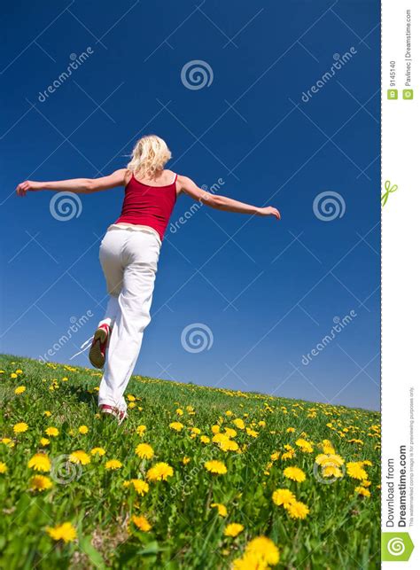 Young Woman In Red Outfit Having Fun On Meadow Stock Photo Image Of