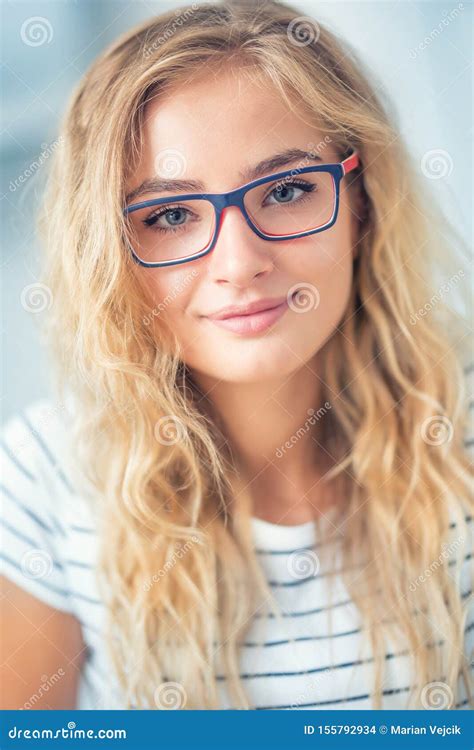 Portrait Of Blonde Young Woman With Glasses Stock Photo Image Of