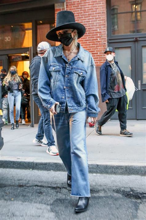 Miley Cyrus Sports Double Denim While Leaving A Building In New York City
