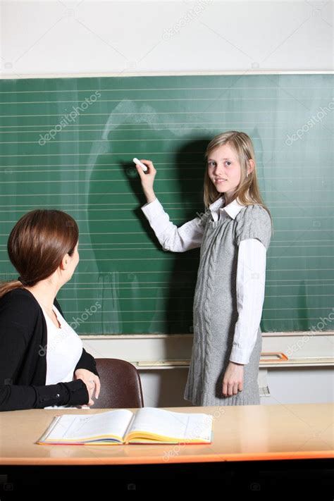 Student In The Classroom Writes On The Blackboard — Stock Photo