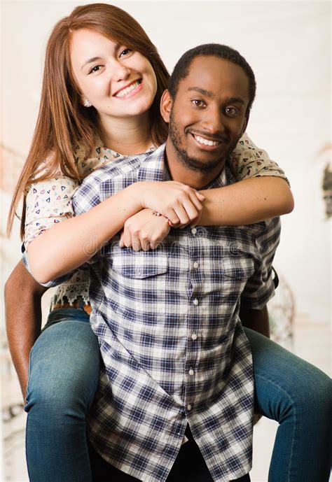 Interracial Couple Wearing Casual Clothes Interacting Having Fun Man