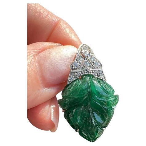 Art Deco Carved Emerald And Diamond Tutti Frutti Leaf Pendant For Sale