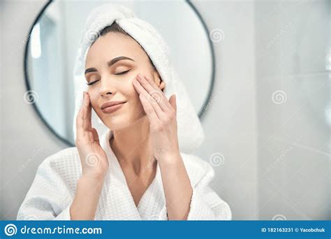 Caucasian Pretty Woman Doing Relaxing Face Massage In Bathroom Stock Image Image Of Nice