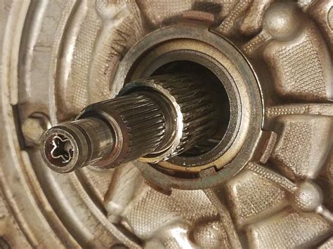 The way to remove it is through the starter port, remove the starter to view the bolts (i assume u have already done so). How to Install a Torque Converter in a 4l60e Transmission ...