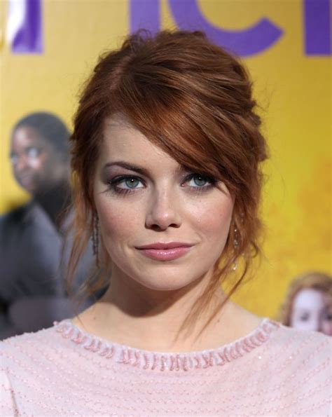 In August 2011 Emma Wears A Messy Updo With Her Signature Red Hair In Tact Photo Dfree