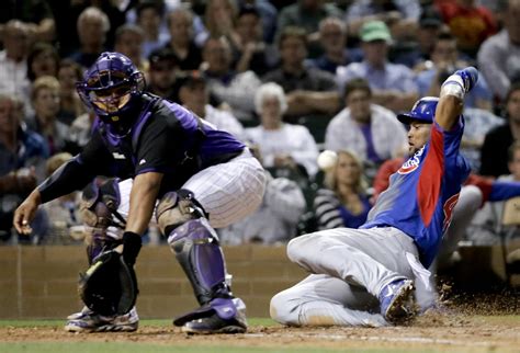 Here are the best baseball games from across the major leagues this week in 2019. Chicago Cubs' Emilio Bonifacio, right, scores past ...
