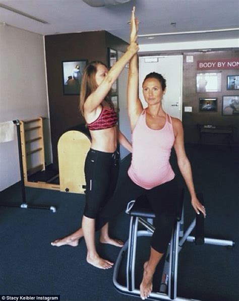 Stacy Keibler Displays Her Baby Bump In Tight Fitting Yoga
