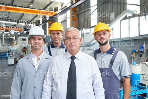 Supervisor And Workers In Factory Stock Photo Download Image Now