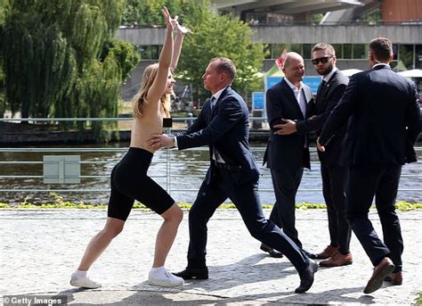 Topless Protesters With Gas Embargo Now Painted On Their Chests Target Olaf Scholz In Berlin