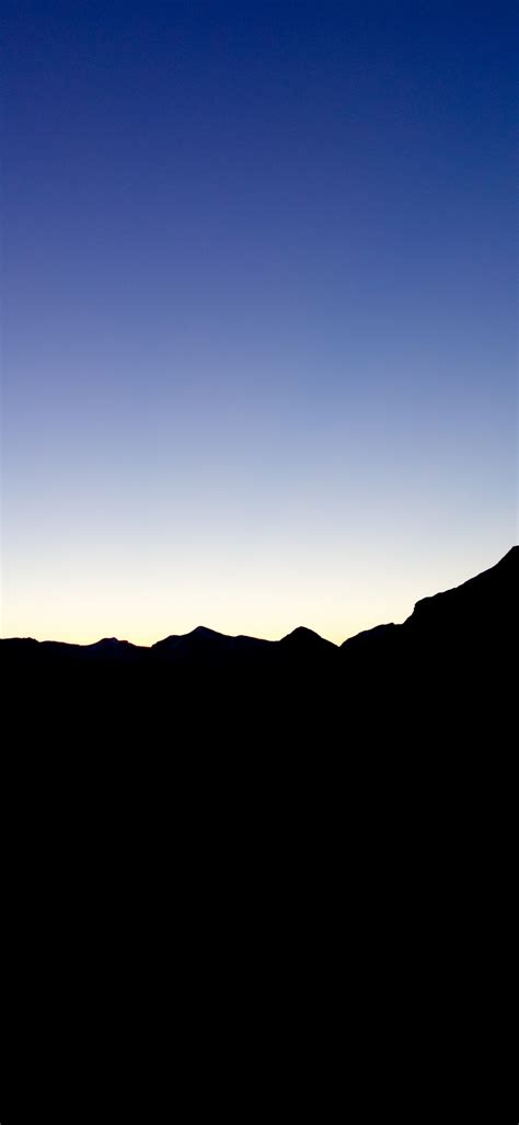 Download Wallpaper 1125x2436 Dawn Sunset Blue Sky Mountains Iphone