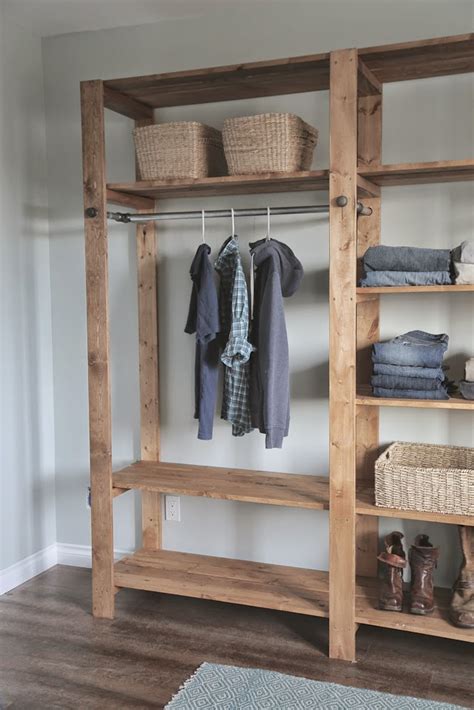 If you have a small closet and budget this design can fit any size closet. Ana White | Industrial Style Wood Slat Closet System with ...
