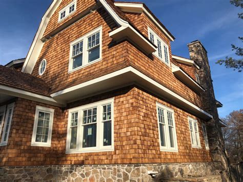 Cedar shakes and shingles are similar wood siding products, but there are some differences between the two house sidings. Cedar Shakes & Shingles