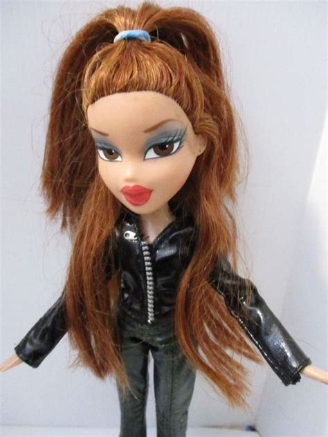 Ariane, a bratz doll with blue eyes and light brown hair. BRATZ DOLL RED LIPS LONG RED HAIR VINYL JEANS & JACKET ...