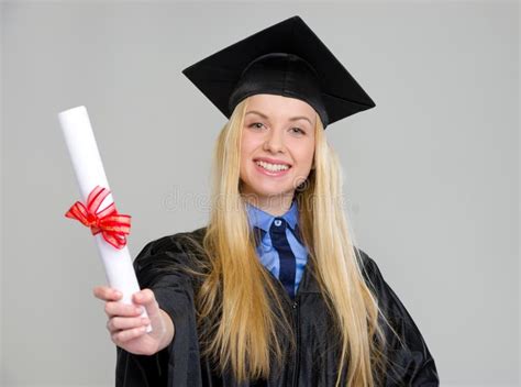 Smiling Woman In Graduation Gown Showing Diploma Stock Image Image Of