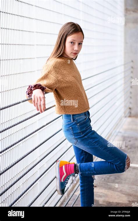 Tween Girl Outdoors Leaning Looking Thoughtful Stock Photo Alamy