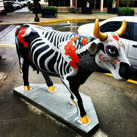 is there a story behind the cow statue fun frost raleigh durham chapel hill cary