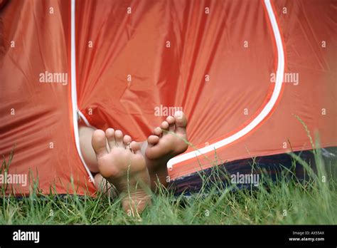 Female Feet Sticking Out Of A Tent Stock Photo Alamy