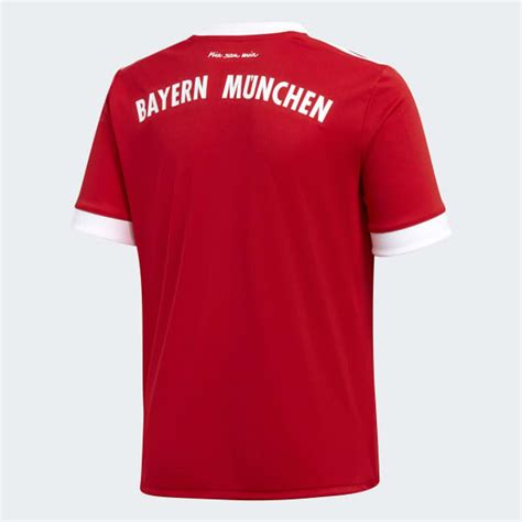 Tiene los colores de la bandera de baviera en el centro y la leyenda fc bayern munchen en blanco en el anillo rojo que los rodea. Camiseta de Local FC Bayern Múnich Réplica - Rojo adidas ...