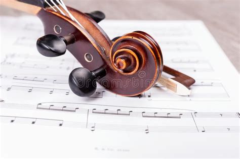 Scroll Of The Classical Violin On Music Notes Stock Image Image Of