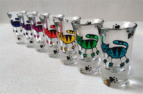 They come in one of two cute cat themed patterns and are available get hammered with these nifty ambigram shot glasses that first tell you what to do, then tell you how you feel. Cats & Paws Shot Glasses Handpainted | Cat paws, Shot ...