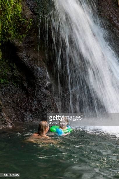 Woman Bathe Waterfall Photos And Premium High Res Pictures Getty Images